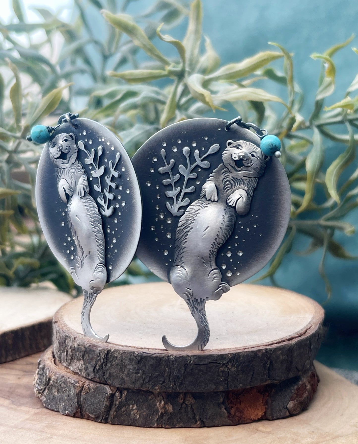 The Otter Floating in The Water Earrings