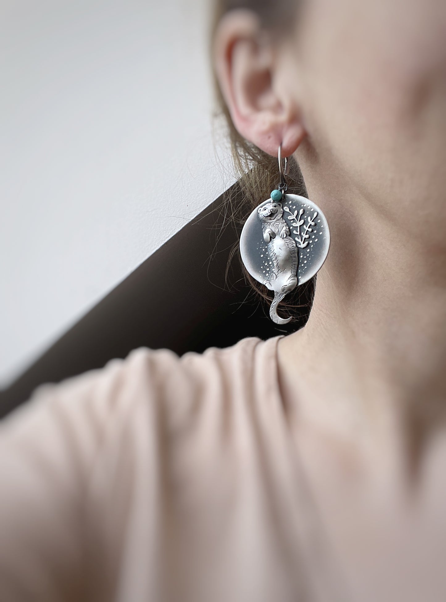 The Otter Floating in The Water Earrings