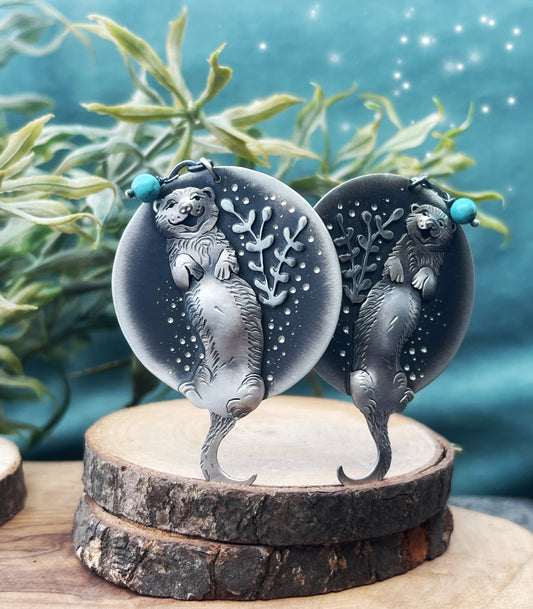 The Otter Floating in The Water Earrings