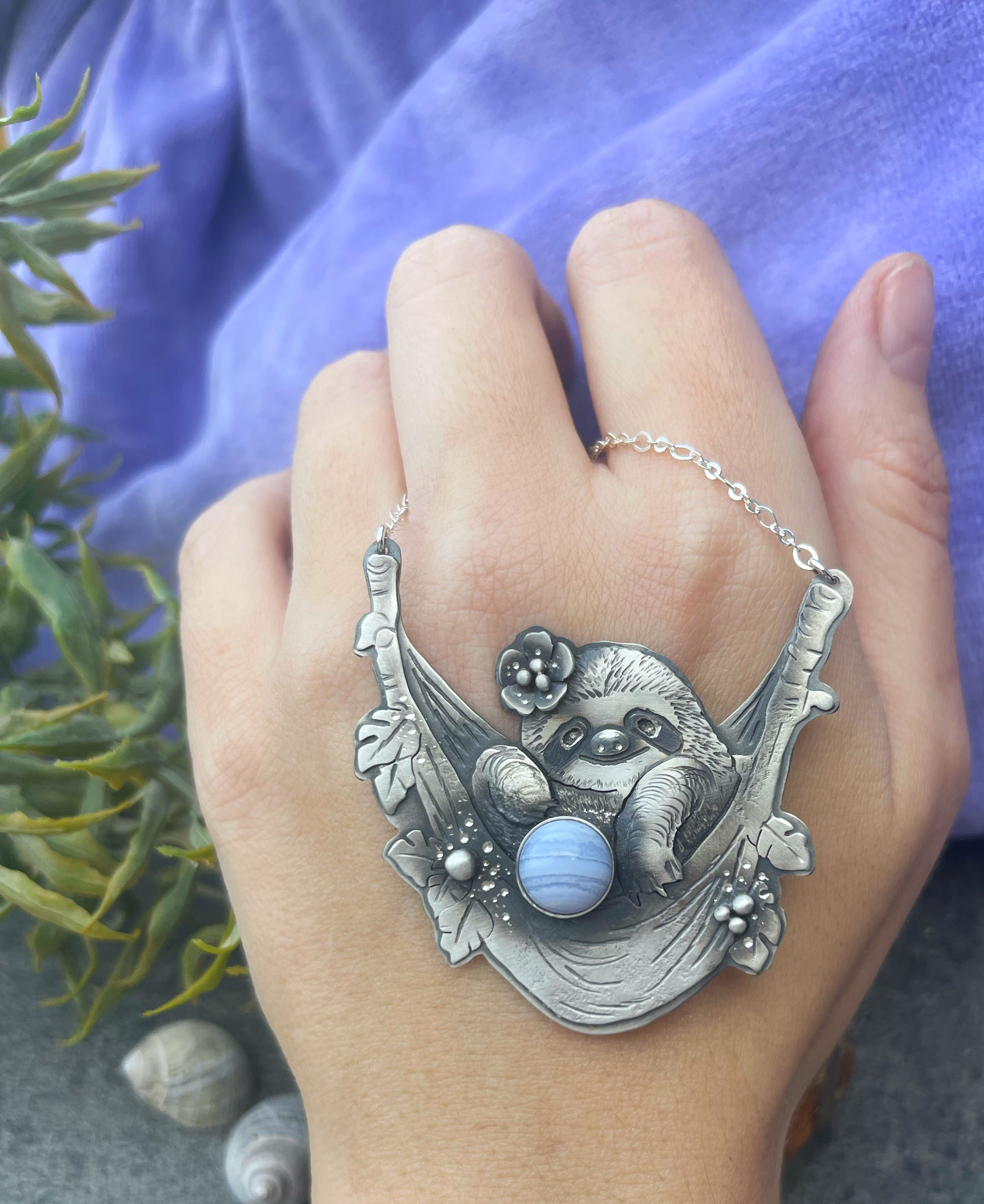 The Sloth Girl in a Hammock & Chalcedony