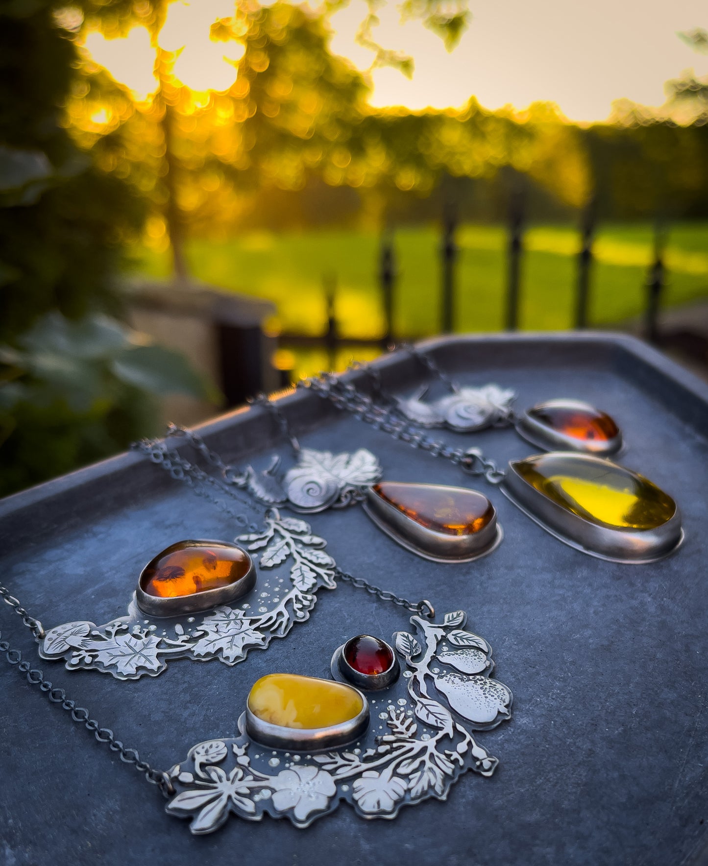 The Autumn Snail Necklace - Baltic Amber