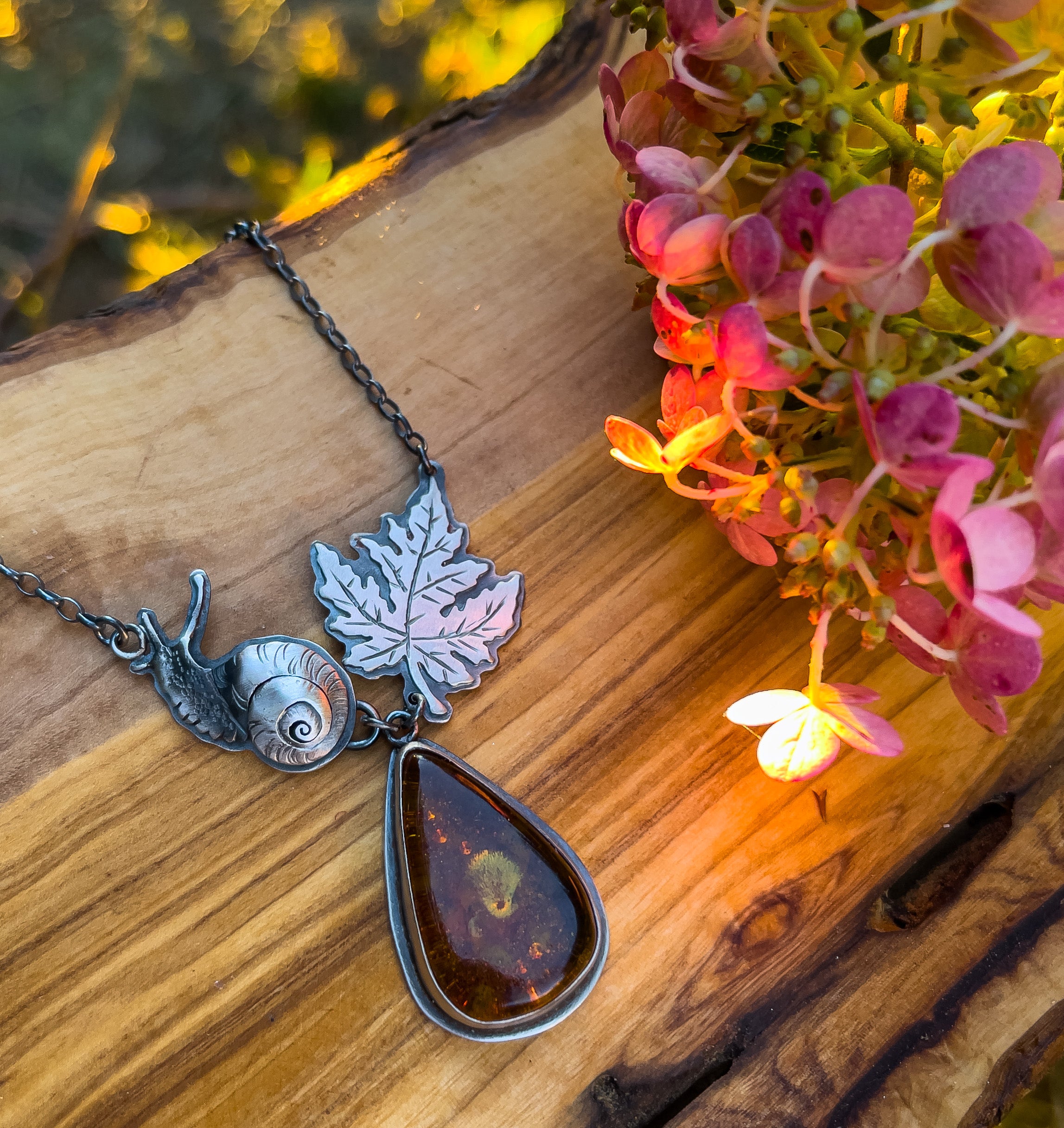 The Autumn Snail Necklace - Baltic Amber