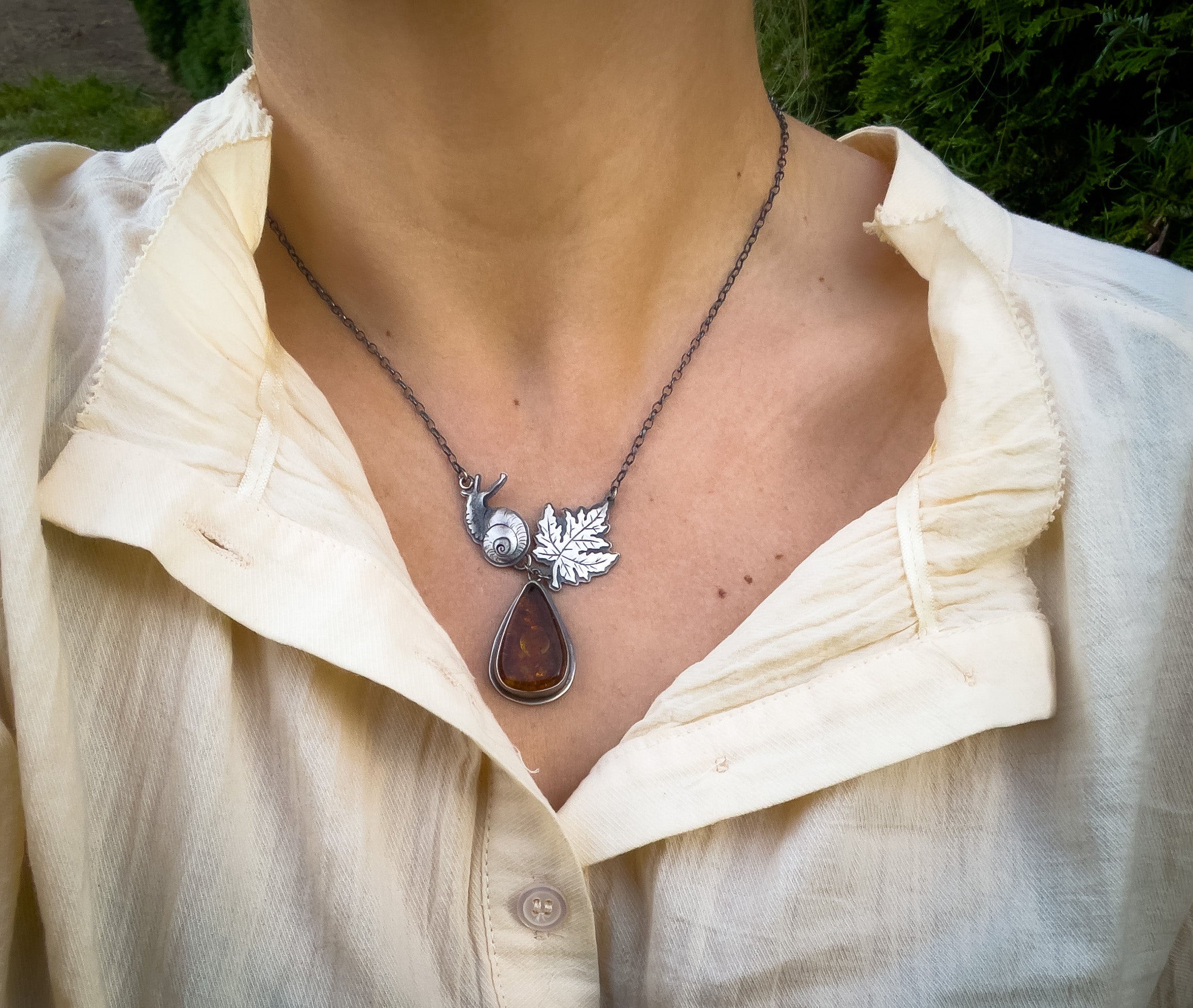 The Autumn Snail Necklace - Baltic Amber